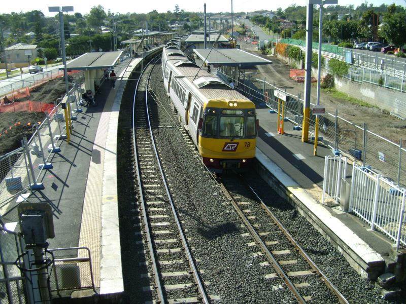 EMU 78 at Darra
EMU 78 at Darra. Early works for the station upgrade and track amplification had commenced. August 2009
